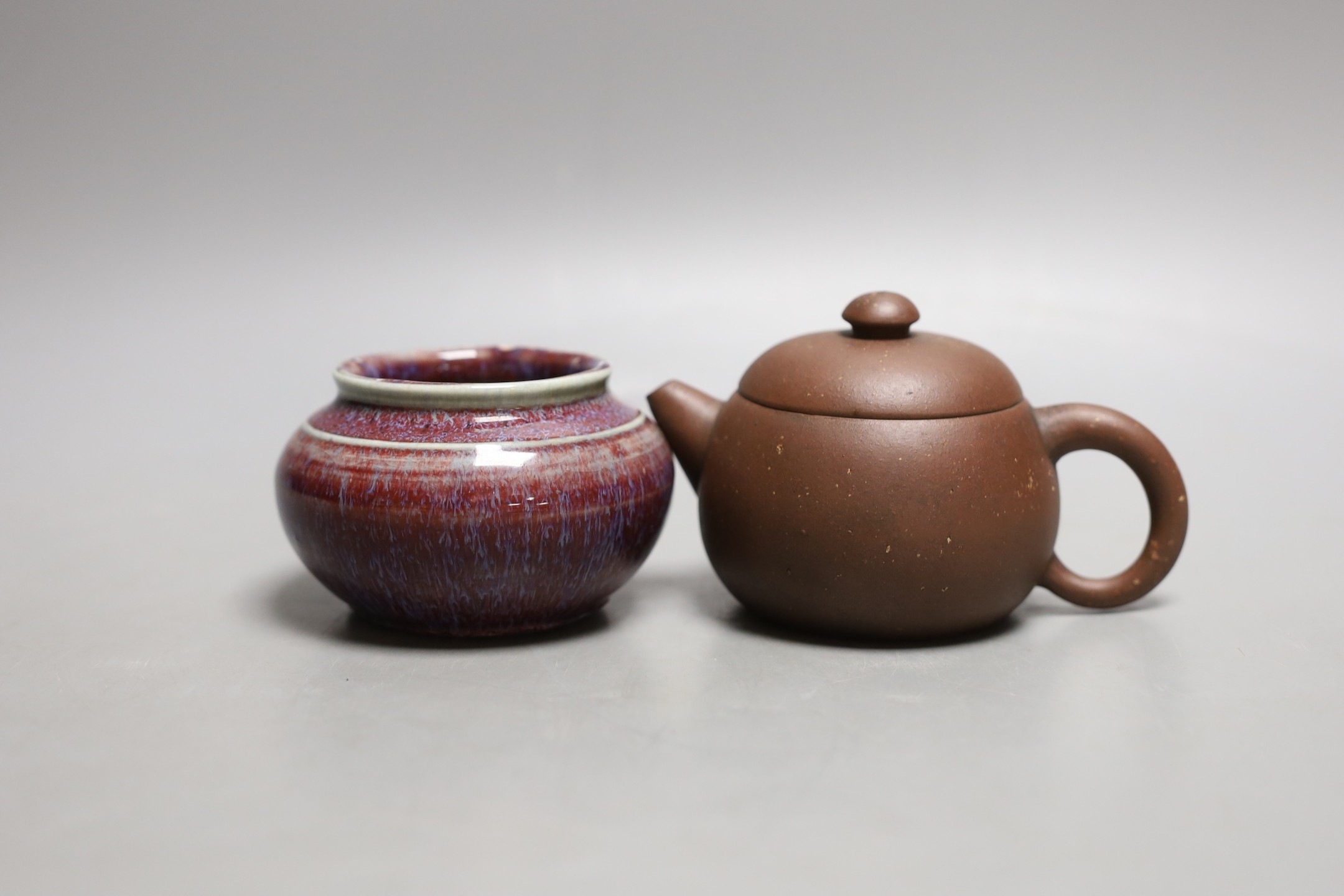 A Chinese flambe waterpot, 6cm tall, and a Yixing teapot